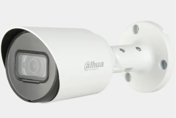 White cylindrical Dahua security camera with black lens ring mounted on bracket, viewed from side angle