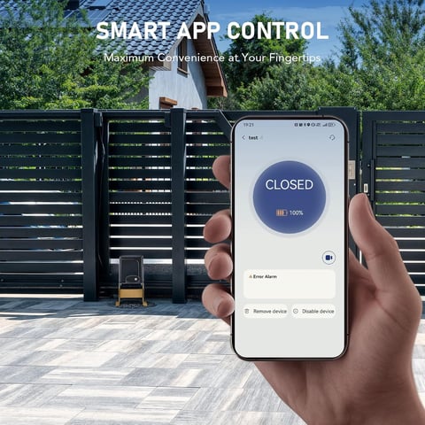 Hand holding smartphone displaying smart gate control app with CLOSED status, black louvered gate in background